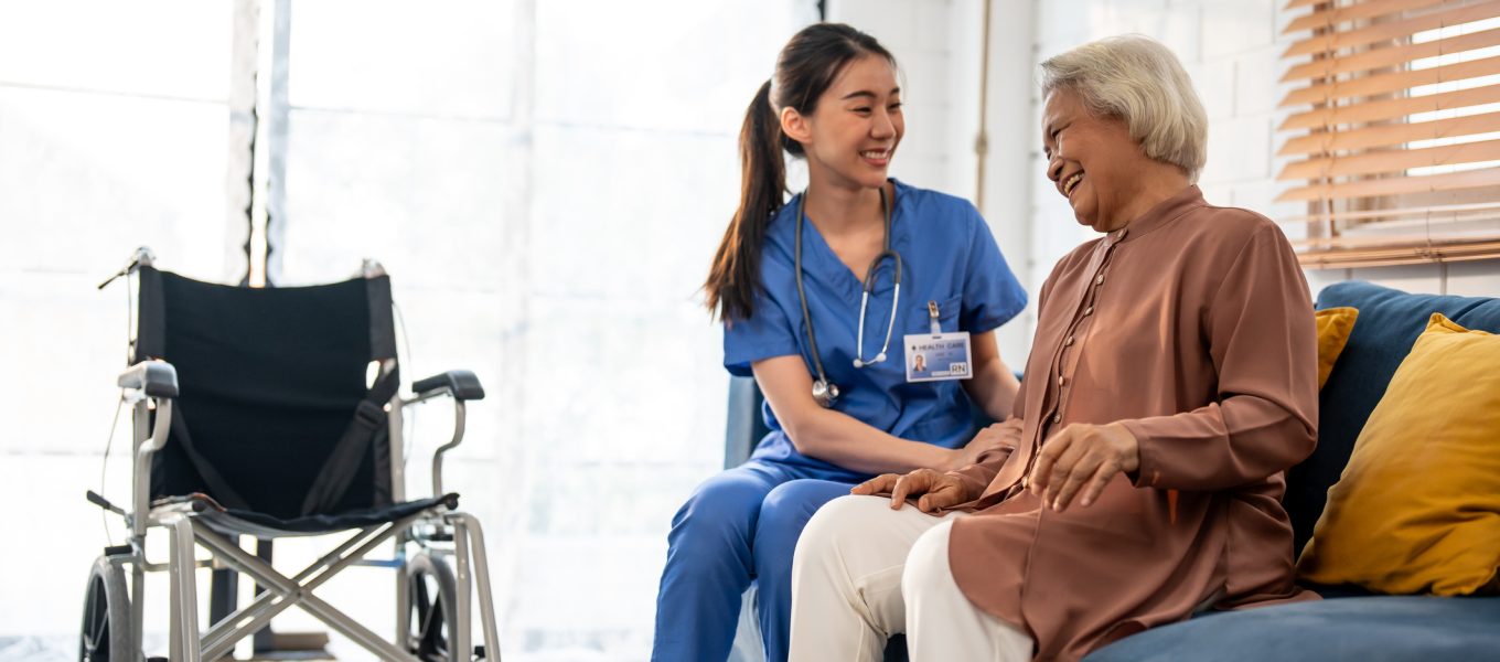 Asian young caregiver nurse examine senior woman patient at home. Attractive specialist carer women support, give advise and consult with older elderly mature grandmother in living room in house. Asian young caregiver nurse examine senior woman patient at home. Attractive specialist carer women support, give advise and consult with older elderly mature grandmother in living room in house.